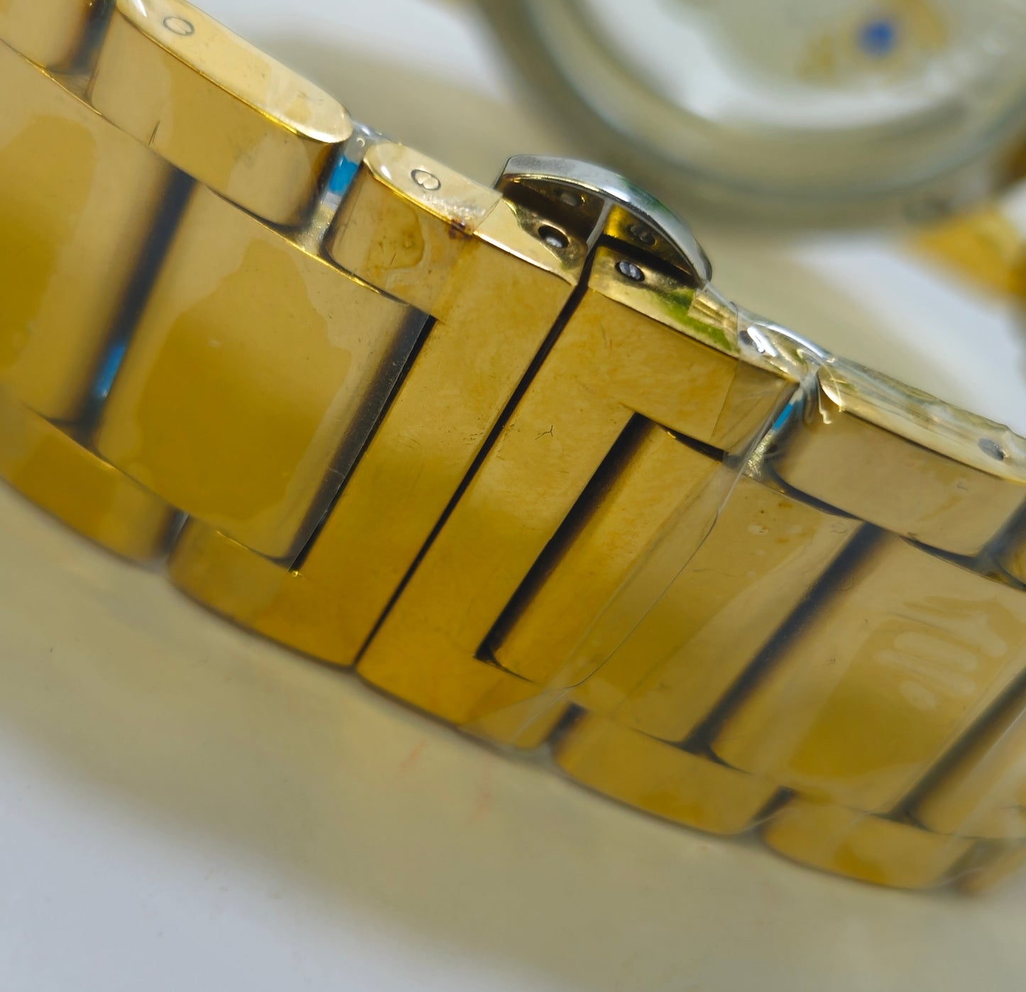 Cartier Golden Watch - Timeless Elegance